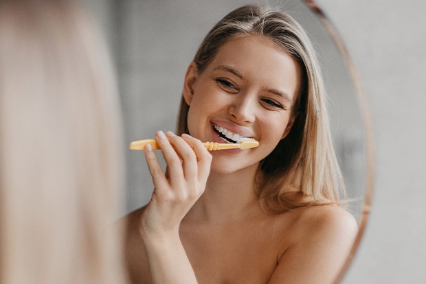 Woman brushing her teeth