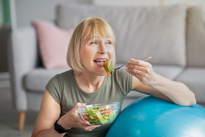 Woman eating a salad