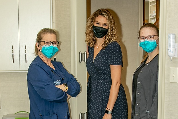 Three dental team members