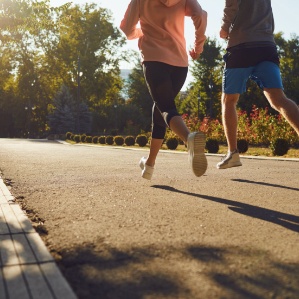 Two people running together