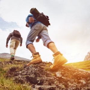 Two people hiking together