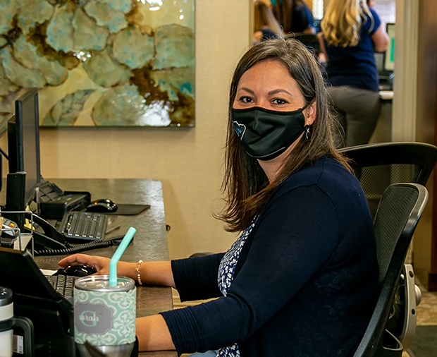 Dental team member filing dental insurance claims