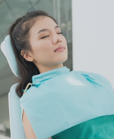 Woman relaxing during sedation dentistry visit