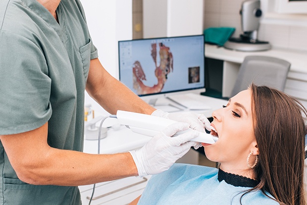 Dentist capturing digital bite impressions