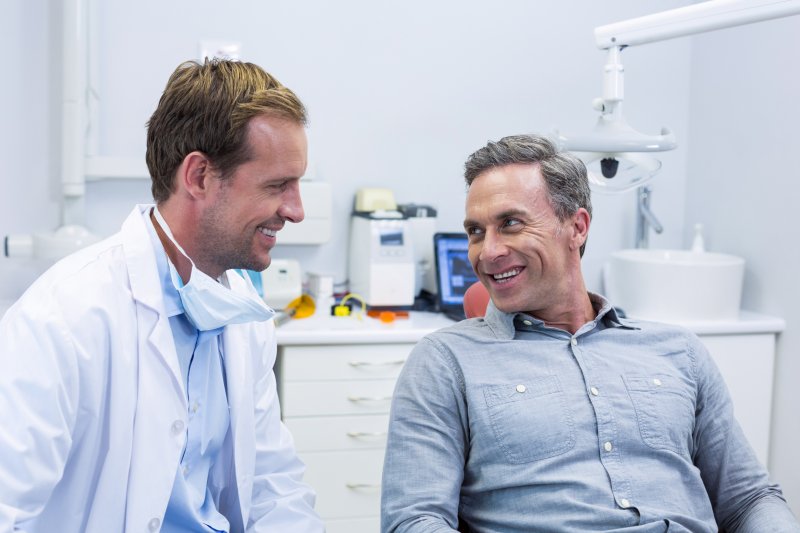 patient attending dental checkup with dentures